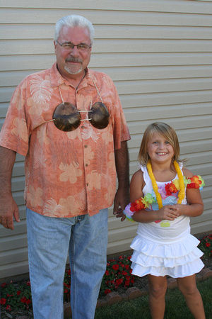 One of Ava's birthday wishes was that Big Lar would wear a coconut bra to her birthday.  Looks like she got her wish, doesn't it?  :-)(September 5, 2009)© Carolyn S. Murray 2009