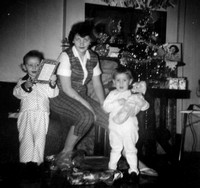 Amma with her two daughters, Debby and Carole, on Christmas morning 1959.