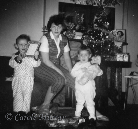 Amma with her two daughters, Debby and Carole, on Christmas morning 1959.