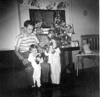 Debby and I with our Dad on Christmas morning, 1959.