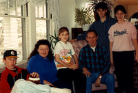 Kevin with Dad, sisters and nephews.