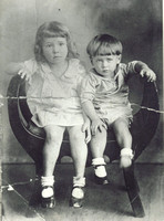 Here's an adorable shot of two of Papaw and Granny's children:  Charlotte Katherine and John Delmar (Dee).