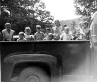This is a great shot from that same summer:  some of the King grandchildren in the back of Papaw's truck!  Carole is being held in the middle of the photo, with her sister Debby looking down in front