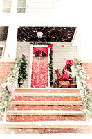 Had to get a photo of the front porch while it was snowing, and before the Christmas decorations came down.  (January 2, 2012)© Carolyn S. Murray 2012