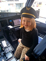 Captain Murray!  On our flight from Cleveland to Newark, they let her sit in the cockpit, wearing one of the pilot's hats!
