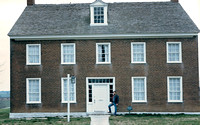 Larry in front of one of the buildings at Shaker Village of Pleasant Hill.