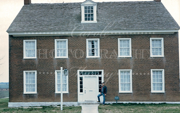Larry in front of one of the buildings at Shaker Village of Pleasant Hill.