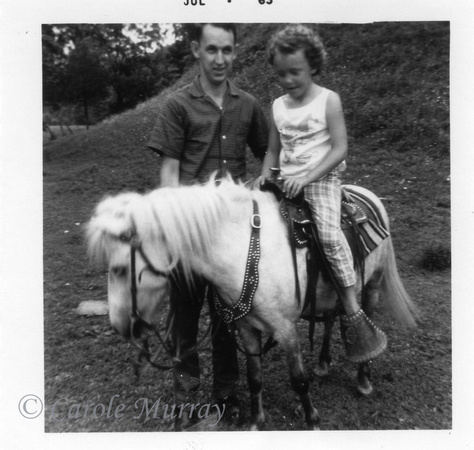 And then it was Debby's turn to ride the ponies.  (July 1963)