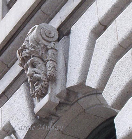 One of the interesting faces adorning the old U.S. Court House.  This stately granite building, the work of renowned architect Arnold W. Brunner, was dedicated in 1911.  It is now known as the Howard