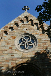 Our Lady of Mercy Roman Catholic Church is a Romanesque stone church.© Carolyn S. Murray 2006