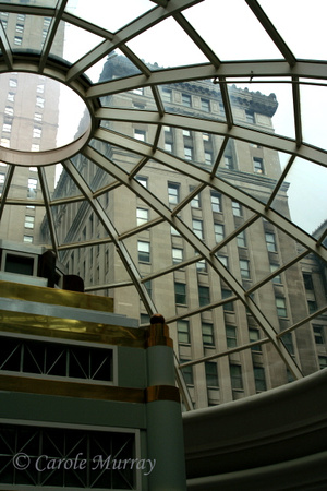 The Tower City complex runs under Prospect Avenue and ends up on the other side of the street, so here's an interesting picture looking at the Terminal Tower through a glass dome of Tower City.© Carol