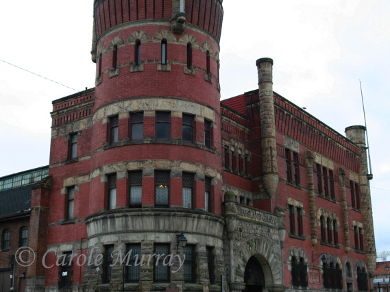 The Cleveland Grays Armory was built in 1893.  F. C. Bate was the architect.    It's most notable feature is the five story tower on the northeast corner of the building.  © Carolyn S. Murray 2007