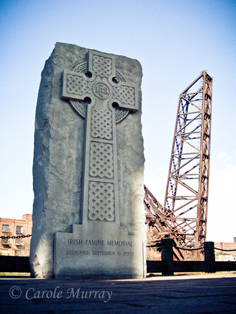 Granite memorial located in The Flats of Cleveland.  On the side facing the Cuyahoga River, it reads:"Cleveland Remembers"The Great Hunger"An Gorta MorIreland's Potato Famine 1845 - 50This memorial co