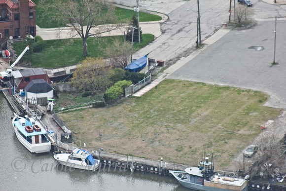 Grass is beginning to grow in the spot where Jim's Steak House used to be.  (April 2012)© Carolyn S. Murray 2012