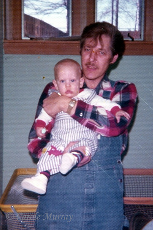 Here's Jeremy being held by his very proud grandpa, Adolph.  (1975)