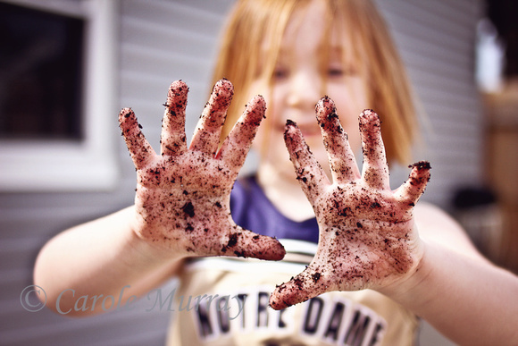 Girl Muddy Hands