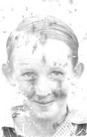 This is the earliest picture we have of Carole's Dad.  It's been damaged over the years, but still shows his nice smile and mischievous eyes.