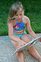 Ashley was nice enough to read a book to us this evening!  (June 9, 2008)© Carolyn S. Murray 2008